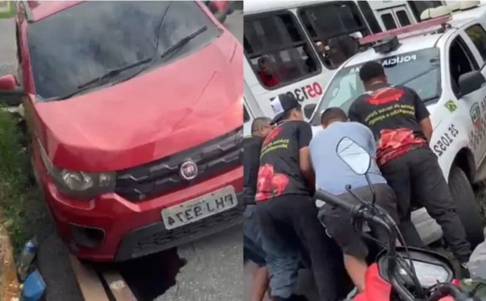 Viatura da PM cai em cratera no bairro Compensa e moradores ajudam