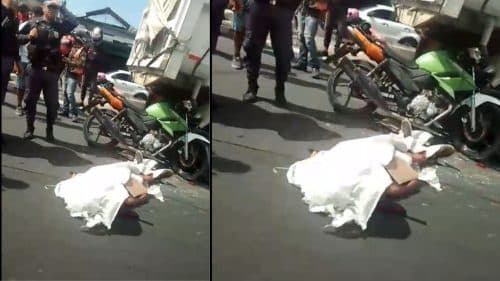 VÍDEOS: Motociclista morre com a cabeça esmagada e mulher fica ferida em acidente com caminhão, em Manaus