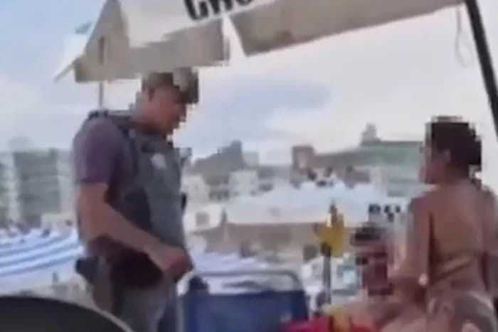 VÍDEO: PM interrompe casal “se pegando” em praia de SP