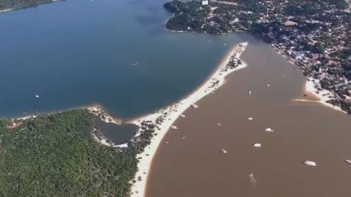 Impacto global: Água escura em Alter do Chão é resultado de garimpo na área (Foto: CNN Brasil)