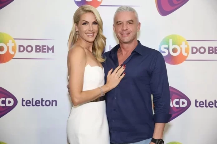 Imagem colorida mostra Ana Hickmann e Alexandre Correa em eventofilantrópico